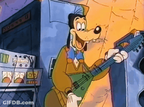 A Goofy Cartoon Character Is Playing A Guitar In Front Of An Amplifier That Has The Letter O On It GIF