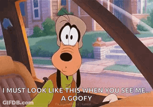 A Goofy Cartoon Character Is Sitting In The Driver 'S Seat Of A Car . GIF