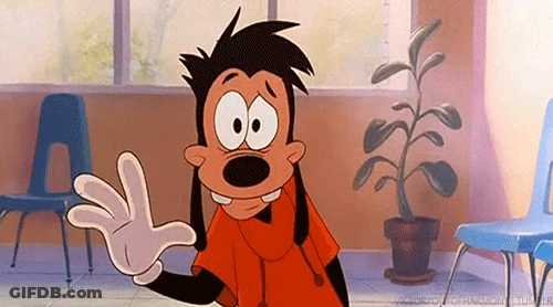 A Goofy Cartoon Character Is Waving His Hand In A Room With Chairs . GIF