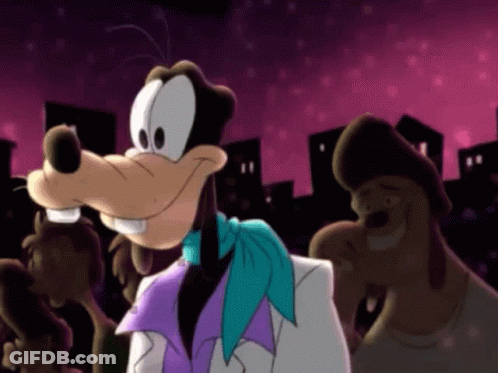 A Goofy Cartoon Character Wearing A Purple Scarf And A White Jacket GIF