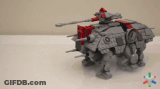 A Gray And Red Lego Robot With A Star Wars Logo On The Side GIF