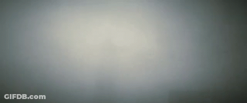 A Gray Background With A Gradient Of Light And Dark GIF