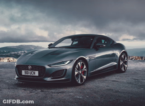 A Gray Sports Car With The License Plate 901 Ucn GIF