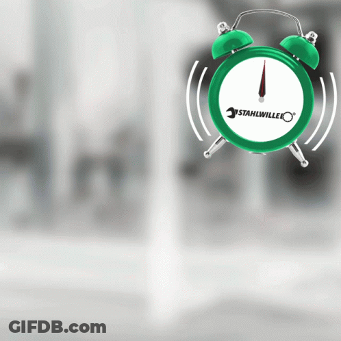 A Green Alarm Clock With Stahlwille On The Face GIF