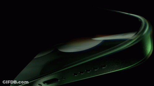 A Green And Black Background With A Few Lines Of Light GIF