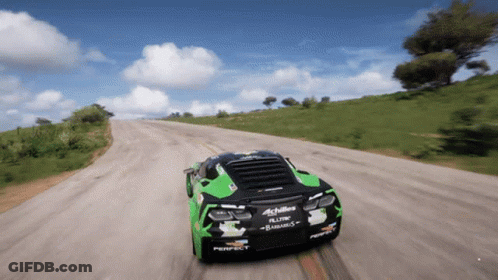 A Green And Black Racing Car With Achilles Written On The Side GIF