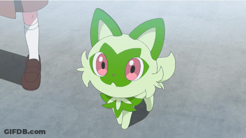 A Green And White Cartoon Cat With Pink Eyes Is Standing Next To A Person GIF