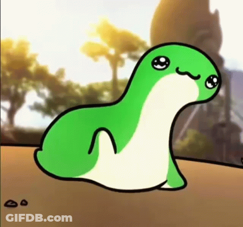 A Green And White Cartoon Frog Is Sitting On Top Of A Sandy Surface . GIF
