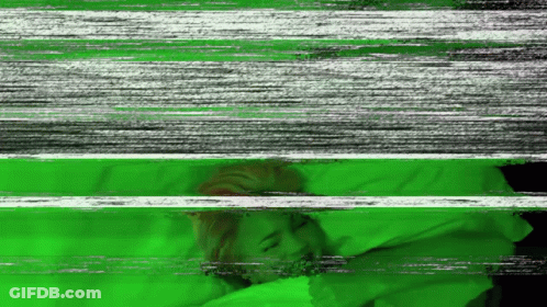 A Green And White Striped Background With A Person Sleeping On It GIF
