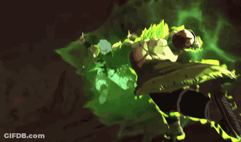 A Green And Yellow Background With A Blurred Image GIF