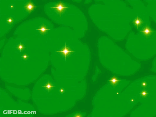 A Green And Yellow Background With A White Glowing Object GIF