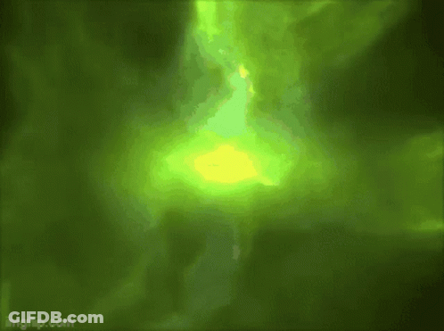 A Green Background With A Yellow Glowing Object In The Middle GIF