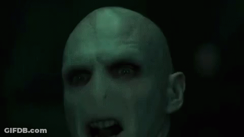 A Green Background With The Words Avada Kedavra Written In White Letters . GIF