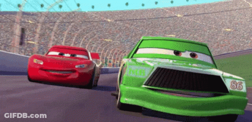 A Green Car With The Number 86 On The Front Is Racing A Red Car GIF