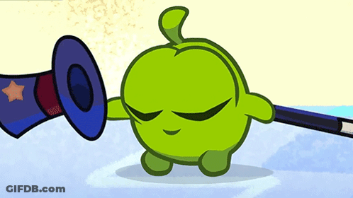 A Green Cartoon Character Is Holding A Magic Wand And A Top Hat GIF