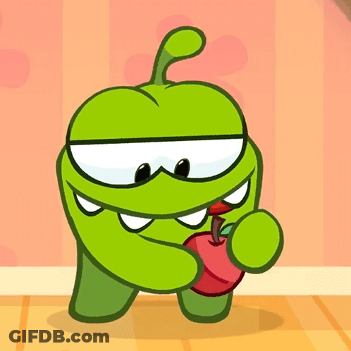 A Green Cartoon Character Is Holding A Red Apple In His Hand GIF