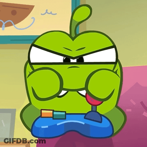 A Green Cartoon Character Is Playing A Video Game With A Controller GIF