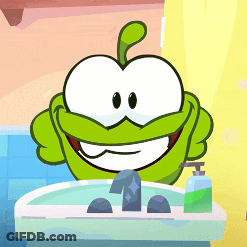 A Green Cartoon Character Is Washing His Hands In A Bathroom Sink GIF