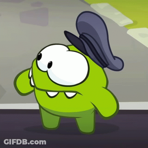 A Green Cartoon Character Is Wearing A Hat GIF