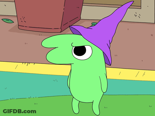 A Green Cartoon Character Is Wearing A Purple Witch Hat GIF