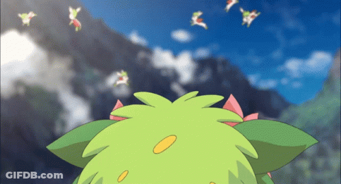 A Green Cartoon Character With A Pink Bow On Its Head Looks Up At The Sky GIF