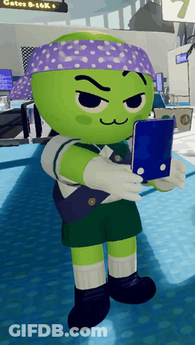 A Green Cartoon Character With A Purple Headband Holding A Cell Phone GIF