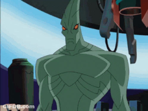 A Green Cartoon Character With Red Eyes And A Pointed Head GIF