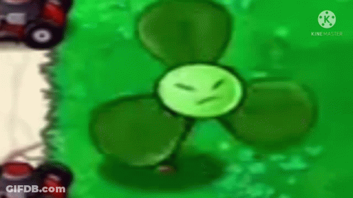 A Green Cartoon Plant With A Face On It Is Sitting On The Ground . GIF