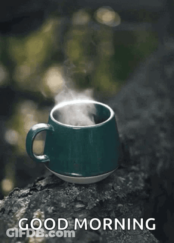 A Green Cup Of Coffee With Steam Coming Out Of It And The Words Good Morning GIF