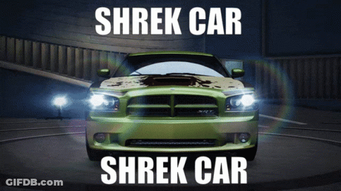 A Green Dodge Charger With Shrek Car Written In White Letters GIF