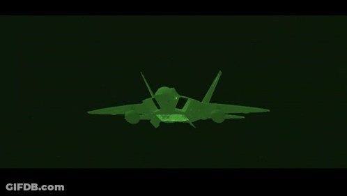A Green Fighter Jet Is Flying Through The Air GIF