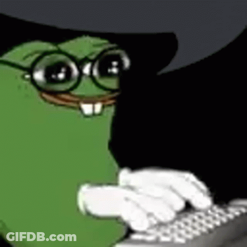 A Green Frog Wearing Glasses And A Black Hat Is Typing On A Laptop . GIF
