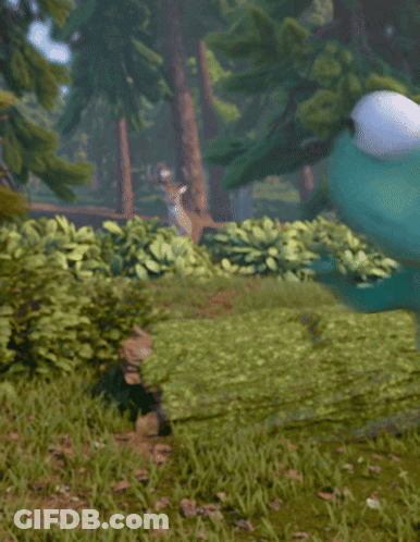 A Green Frog With White Eyes Is Standing In A Field GIF