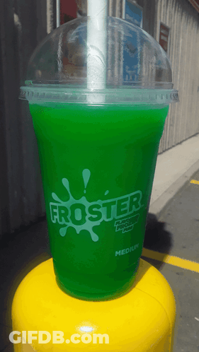 A Green Froster Cup With A Straw In It GIF