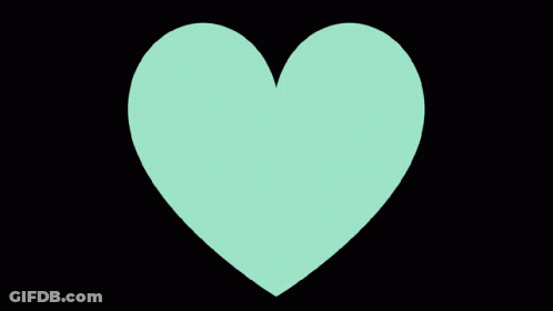 A Green Heart On A Black Background GIF
