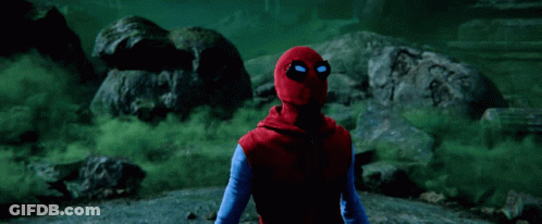 A Green Light Is Shining On A Man And Woman GIF