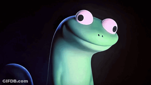 A Green Lizard With Pink Eyes Is Smiling GIF