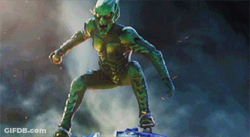 A Green Monster Is Standing On A Blue Object GIF