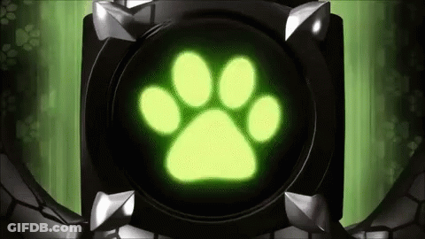 A Green Paw Print Is Glowing In The Dark On A Green Background . GIF