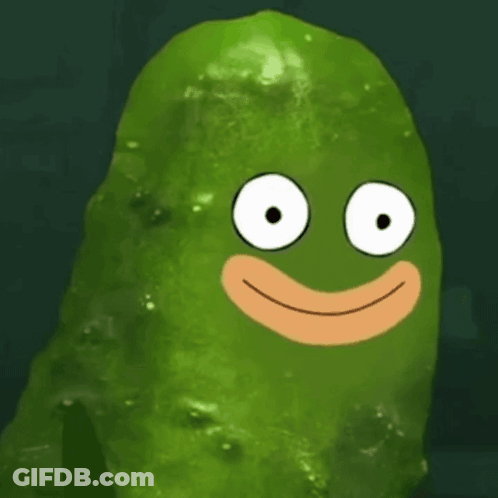 A Green Pickle With A Cartoon Face On It 'S Face . GIF