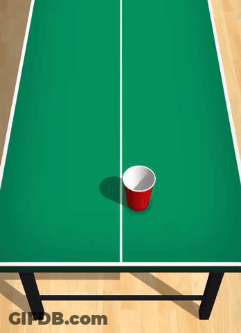 A Green Ping Pong Table With A Red Cup In The Middle GIF