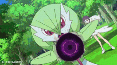 A Green Pokemon With A Purple Circle In Its Mouth GIF