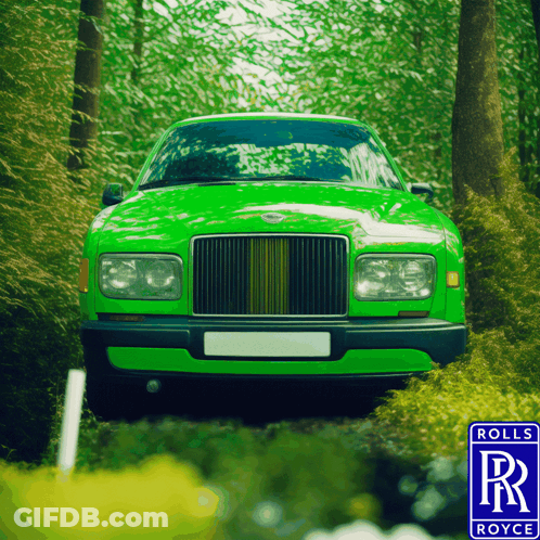 A Green Rolls Royce Car Is Parked In The Middle Of A Forest GIF