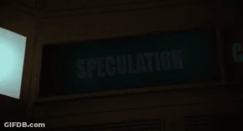 A Green Sign That Says Speculation Is Lit Up At Night GIF