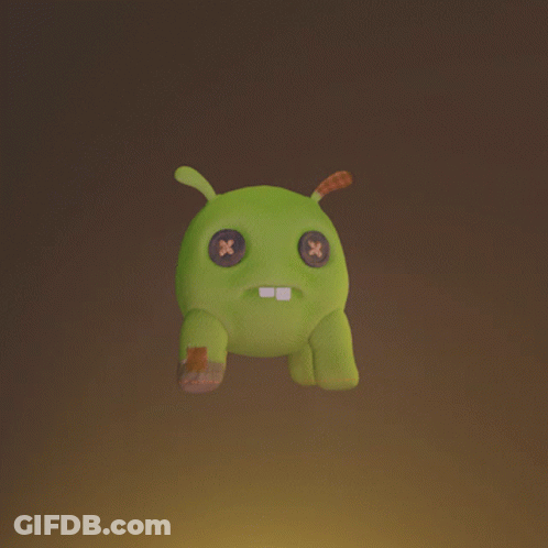 A Green Stuffed Animal With A Leaf On It 'S Back GIF