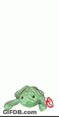 A Green Stuffed Frog With A Tag That Says ' Ty ' On It GIF