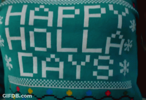 A Green Sweater That Says Happy Holla Days GIF