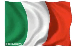 A Green White And Red Flag Is Flying In The Wind GIF
