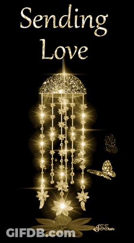 A Greeting Card That Says Sending Love With A Hanging Decoration GIF
