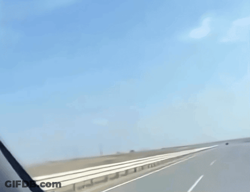 A Grim Reaper Is Holding A Scythe While Riding A Motorcycle GIF